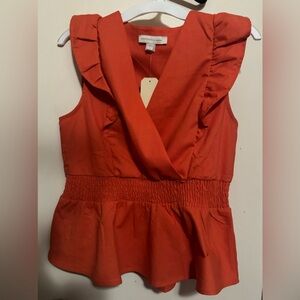 Peplum style top